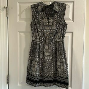 Black and white dress with collar and gold buttons